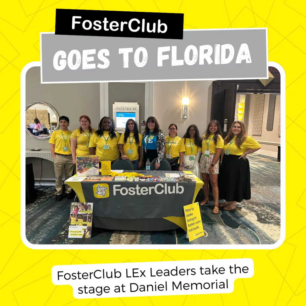 Group of FosterClub LEx Leaders wearing bright yellow shirts stand together behind a FosterClub table at the Daniel Memorial conference. The table is covered with FosterClub materials, including flyers, booklets, and buttons. The graphic text reads: ‘FosterClub Goes to Florida.’ A caption at the bottom says: ‘FosterClub LEx Leaders take the stage at Daniel Memorial.’ The background is bright yellow with abstract line patterns.
